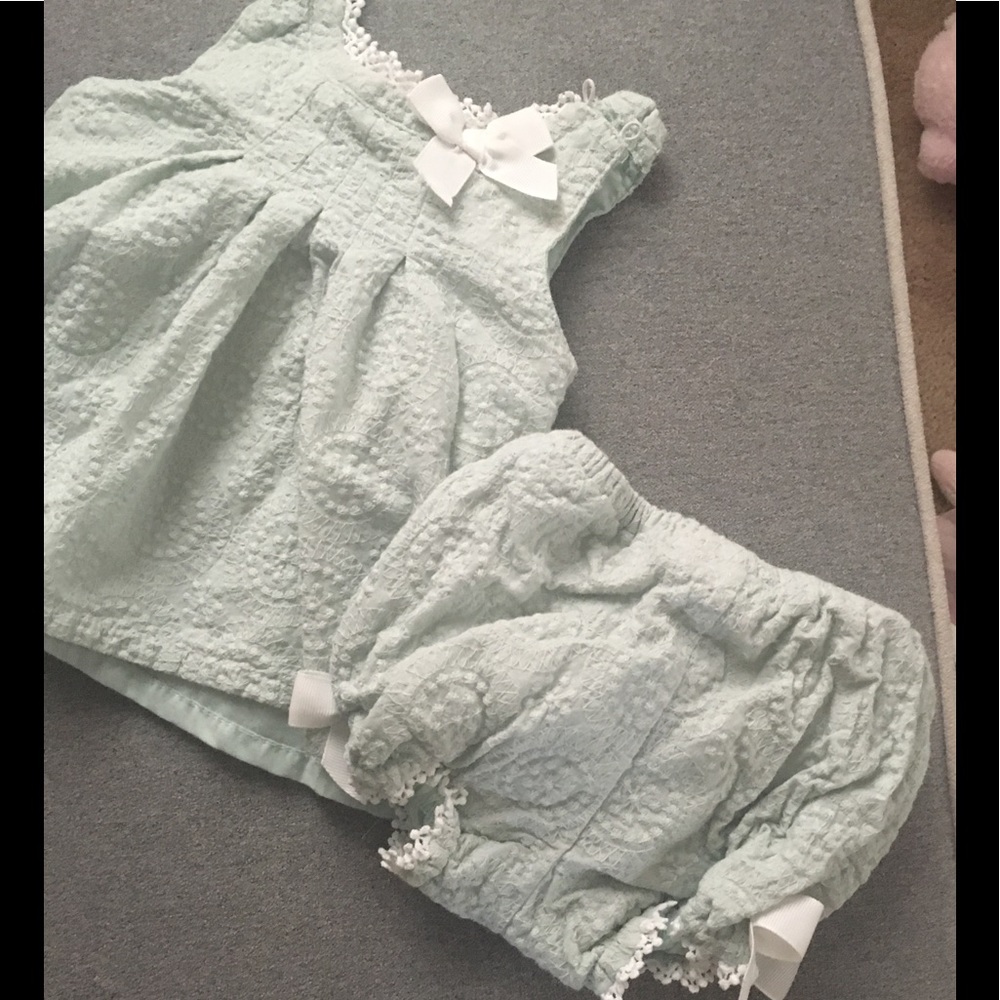 Adorable light green dress with romper bottom.